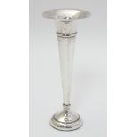 A silver bud vase of trumpet form hallmarked Birmingham 1965 maker J B Chatterley & Sons Ltd.