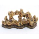 A Chinese sculpture of stylised coral. Chinese character marks to base. Approx.