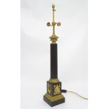 A French Empire Style bronze and ormolou 2 branch column table / side lamp with harp and figural