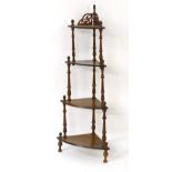 A 19thC rosewood four tier corner whatnot, with turned supports,