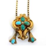 A yellow metal necklace and pendant,