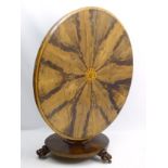 A mid / late 19thC tilt top breakfast table with circular top having marquetry detailing to the