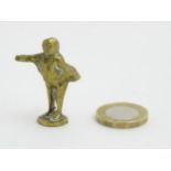 Pipe smoking: A mid-20thC brass pipe tamper, formed as a Victorian gentleman taking a bow,