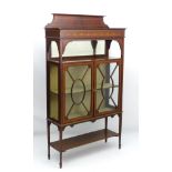 An Edwardian mahogany China cabinet / display cabinet with moulded cornice and marquetry inlay to