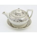 A white Wedgewood teapot and saucer with banded silver lustre decoration. Teapot approx.