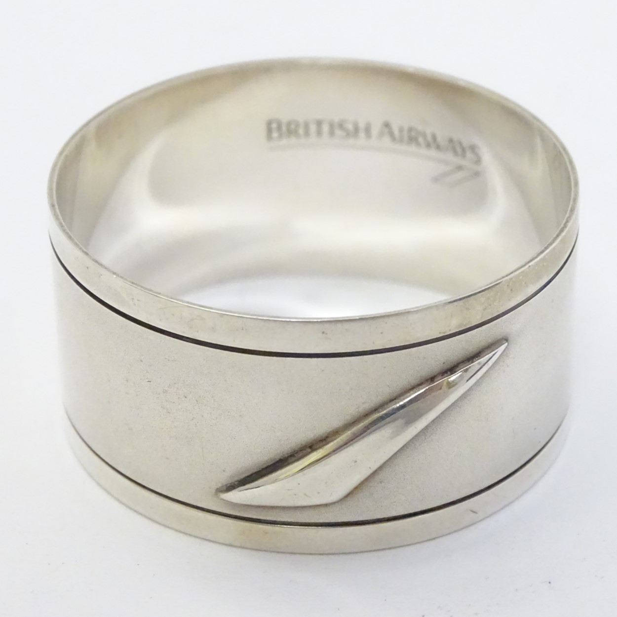 British Airways : A silver napkin ring with concord emblem hallmarked Sheffield 1992 maker British