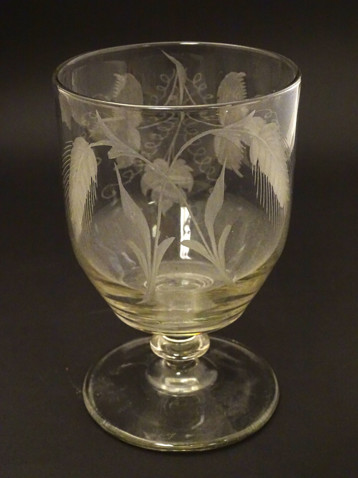 Georgian Rummer: A pedestal glass with wheel cut decoration of an a Vine and two ears of Barley,