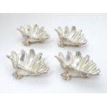 A set of 4 late 20thC / early 21stC silver plate table salts of shell form.