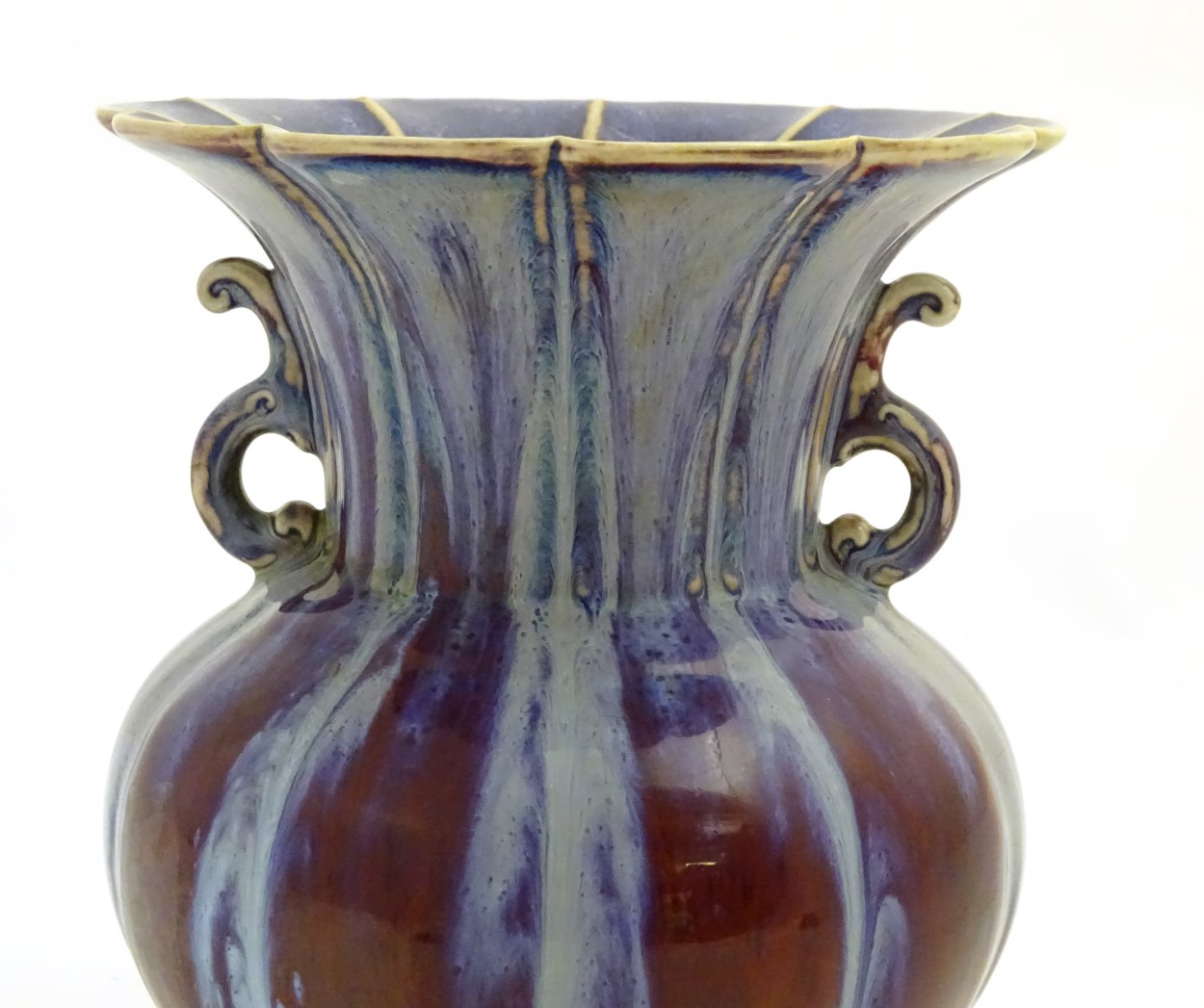 A twin handled Chinese high-fired, flambe globular vase with a splayed foot and flared rim. - Image 6 of 9