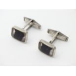 A pair of Sterling Silver cufflink set with Blue John.