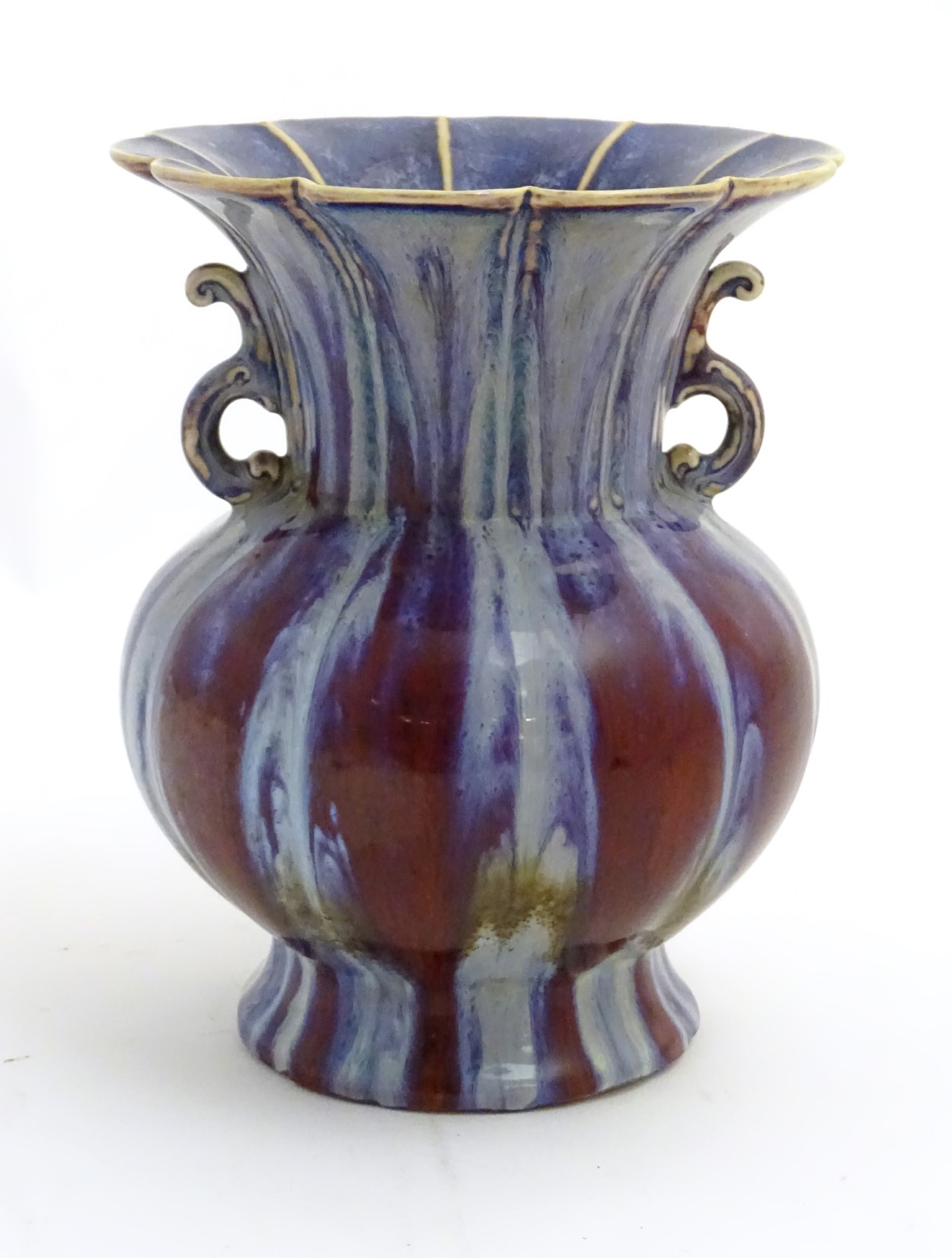 A twin handled Chinese high-fired, flambe globular vase with a splayed foot and flared rim. - Image 4 of 9