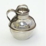 A Victorian silver novelty pepperette formed as a Guernsey / channel island cream / milk pot.