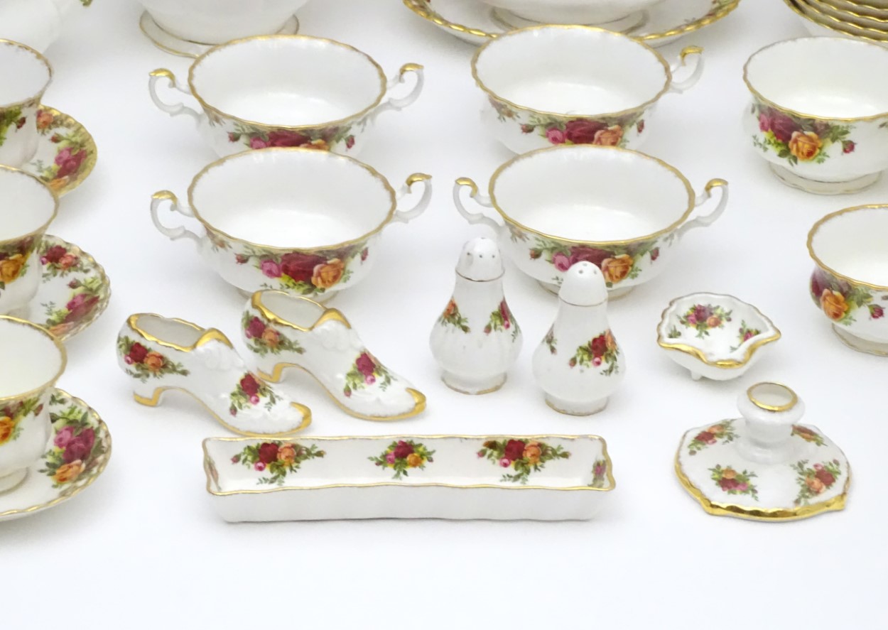 A large quantity of Royal Albert dinner wares in 'Old Country Roses', to include plates, teapots, - Image 7 of 14