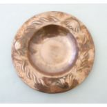 Arts and Crafts Decorative Metalware : An embossed and plannished copper offertory bowl.