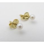 A pair of pearl stud earrings CONDITION: Please Note - we do not make reference to
