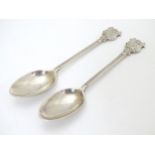 Sporting Interest: A pair of silver teaspoons hallmarked London 1931 maker Goldsmiths &