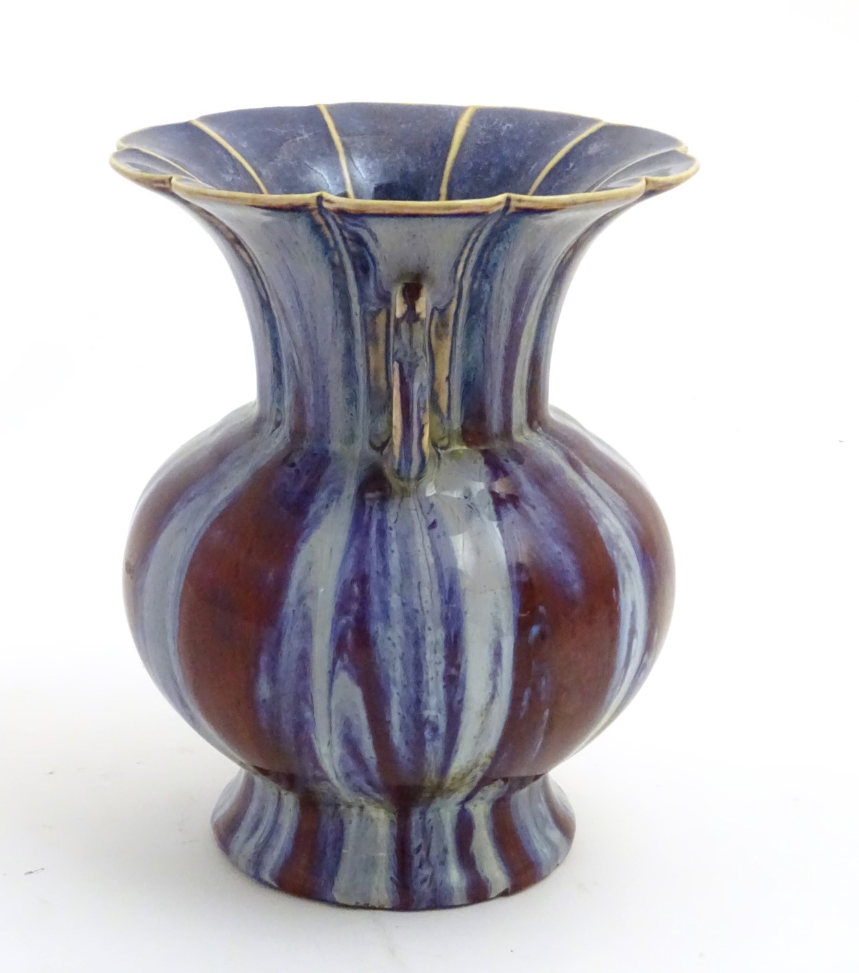 A twin handled Chinese high-fired, flambe globular vase with a splayed foot and flared rim. - Image 3 of 9