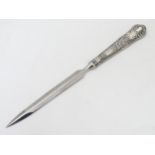 A silver handled letter opener. Hallmarked Sheffield 1989.