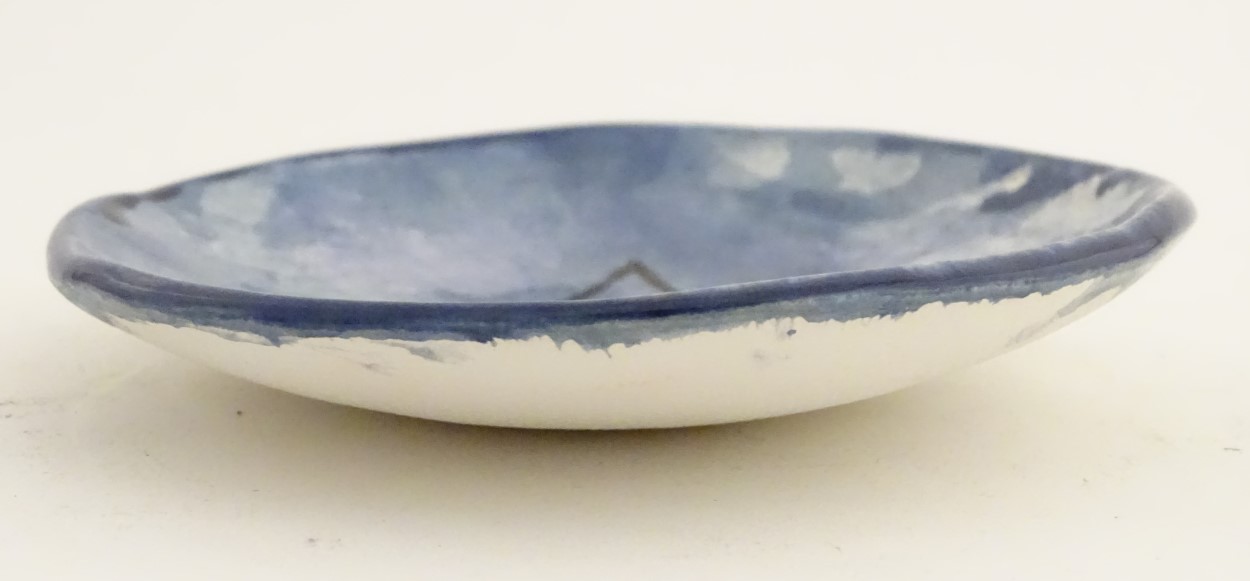 Minty Mountain: A local studio pottery small blue glazed dish decorated with a stylised mountain. - Image 5 of 5