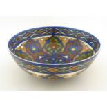 A Royal Doulton bowl decorated with Islamic inspired patterns,