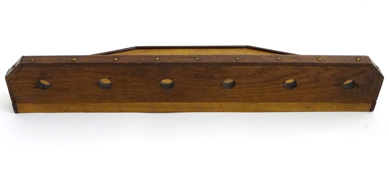 Pipe smoking: An early 20thC oak pipe rack, with provision for nine pipes, - Image 8 of 12