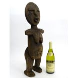 Tribal : An Ethnographic Native Tribal West African female figure with weathered patina. Approx.