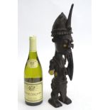 Tribal : An Ethnographic Native Tribal West African male figure holding a shield. Approx. 17" high.