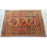 Rug carpet: A handmade rug having orange centre ground, black, brown, mushroom and red colours,