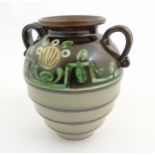 Scandinavian Studio Pottery: A Swedish two handled vase by Ekeby, Uppsala, makers mark to base,