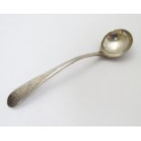 A Geo III silver Old English pattern salt spoon. Hallmarked Newcastle c.