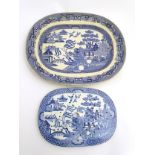 A blue and white Willow pattern oval meat plate and matching oval drainer. Meat plate approx.
