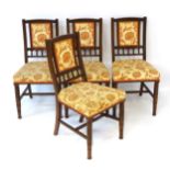 A set of four late 19thC walnut Bruce James Talbert designed chairs with a gadrooned top rail,