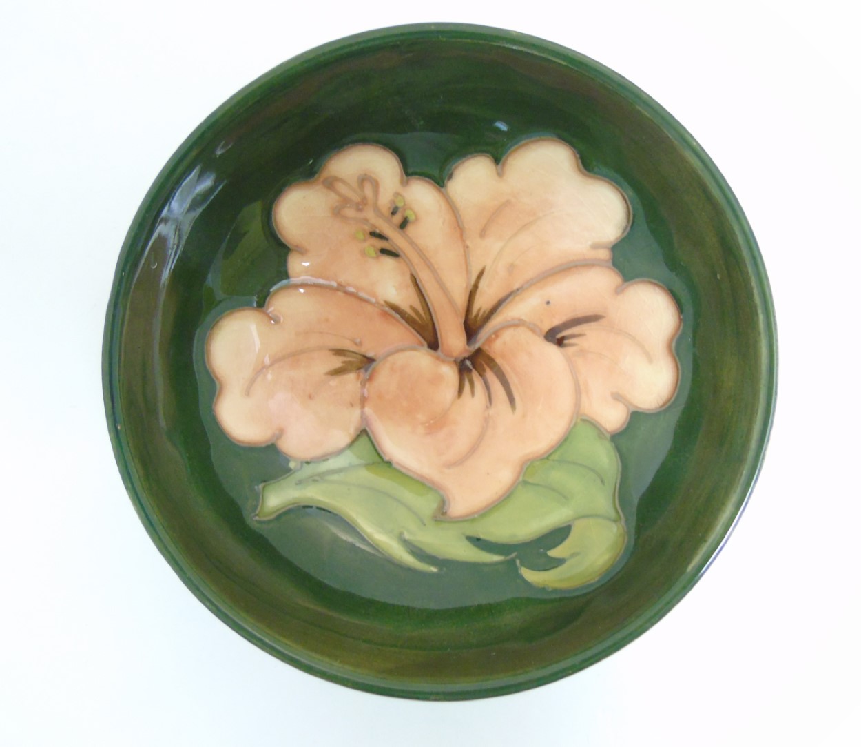 A Moorcroft Hibiscus pottery bowl dish, with pink hibiscus design on green ground, - Image 2 of 6