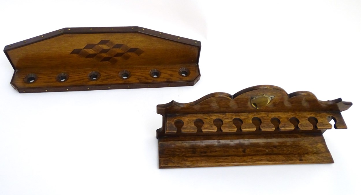 Pipe smoking: An early 20thC oak pipe rack, with provision for nine pipes, - Image 4 of 12