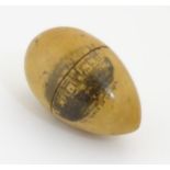 Mauchline ware : A Turned treen needlework thimble case of egg form,