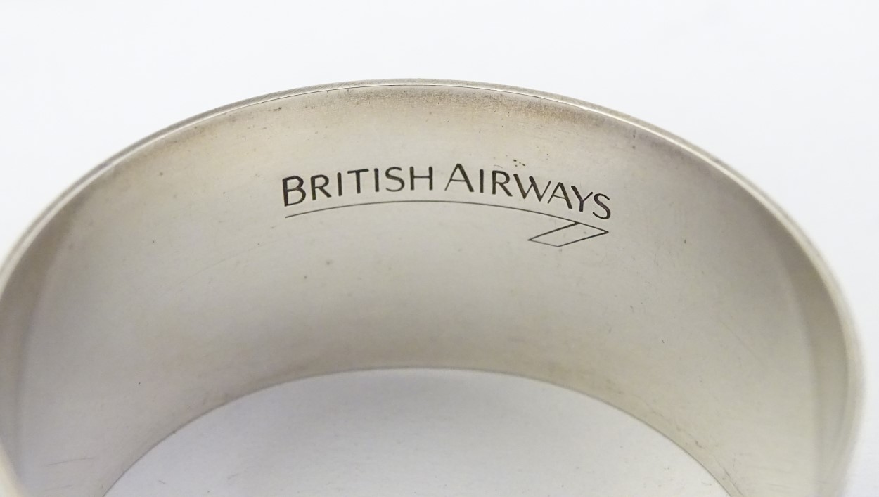 British Airways : A silver napkin ring with concord emblem hallmarked Sheffield 1992 maker British - Image 5 of 5