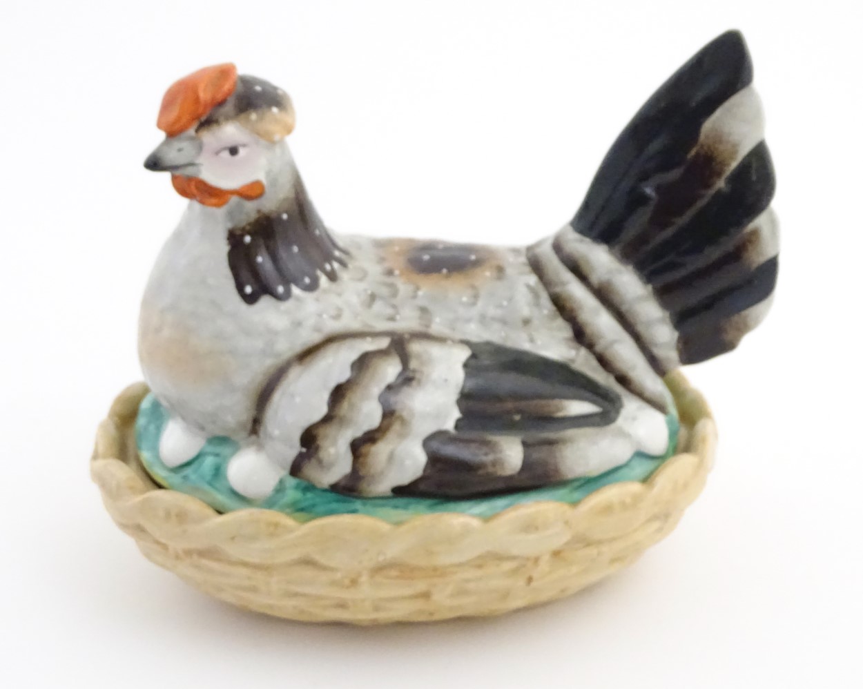 A 19thC Staffordshire hen on nest tureen with light brown basket, approx.