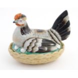 A 19thC Staffordshire hen on nest tureen with light brown basket, approx.