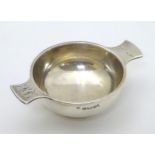 A small silver quaich hallmarked Birmingham 1922 maker Charles S Green & Co Ltd.