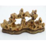 A Chinese sculpture of stylised coral. Chinese character marks to base. Approx.