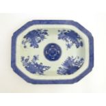 An oriental blue and white rectangular dish with canted corners,