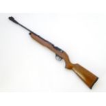 Airgun: An 'XT501 Rabbit Destroyer' .22/5.5mm CO2 bolt-action air rifle by SMK, England.