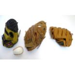 Baseball : 3 various leather baseball gloves together with a ball CONDITION: Please