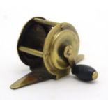 Fishing : a small brass coarse fisherman's live bait fishing reel ,