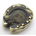 A novelty brass vesta case with horse shoe and horse head decoration.