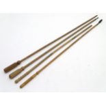 Shooting: A collection of four antique shotgun cleaning rods,