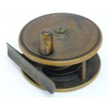 Fly-Fishing : a circa 1900 brass and composite ? sided 2 7/8”reel with clicker ,