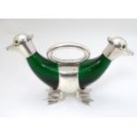 A 21stC novelty double ended small duck claret jug of green glass and silver plate ,