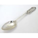 Golf Interest : A silver teaspoon with decoration to handle depicting a golfer.