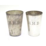 A pair of early-to-mid 20thC silver plated stacking pint beakers, of tapering form,